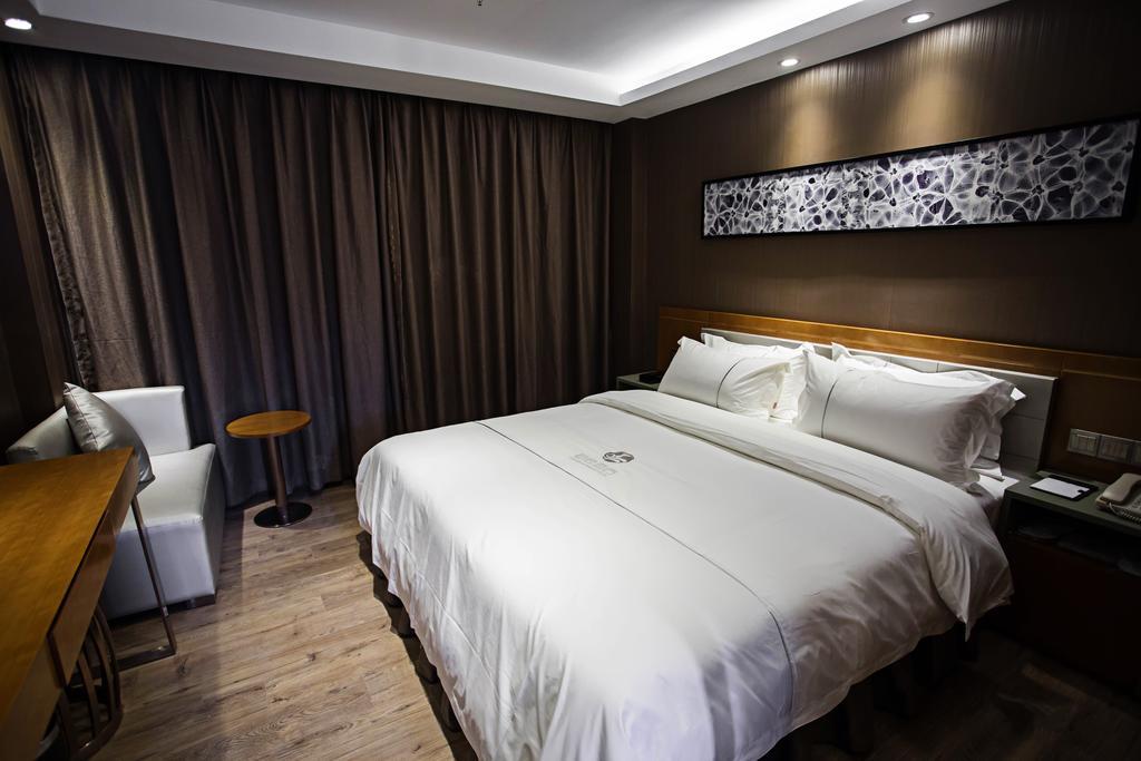 Insail Hotel Джухай Стая снимка